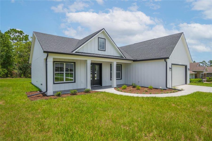 Front exterior of a new home in , Inverness, FL, highlighting curb appeal (Image 28).