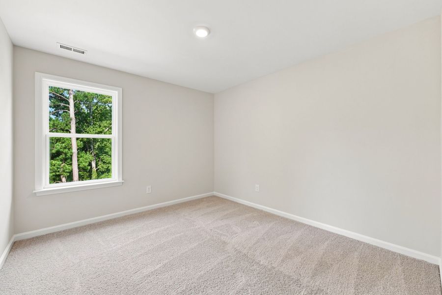 Spacious, unfurnished interior of a new home in Neill's Pointe, Angier (Image 28).