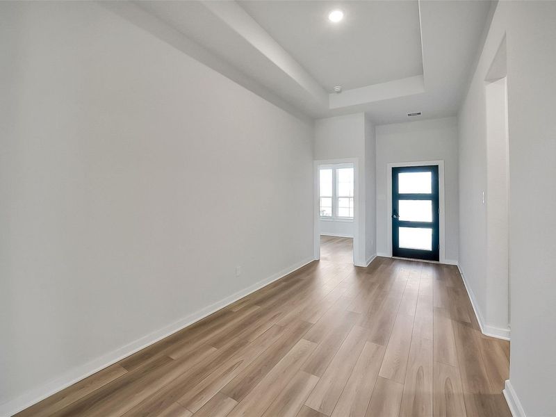 Spacious, unfurnished interior of a new home in Sunterra, Katy (Image 24).