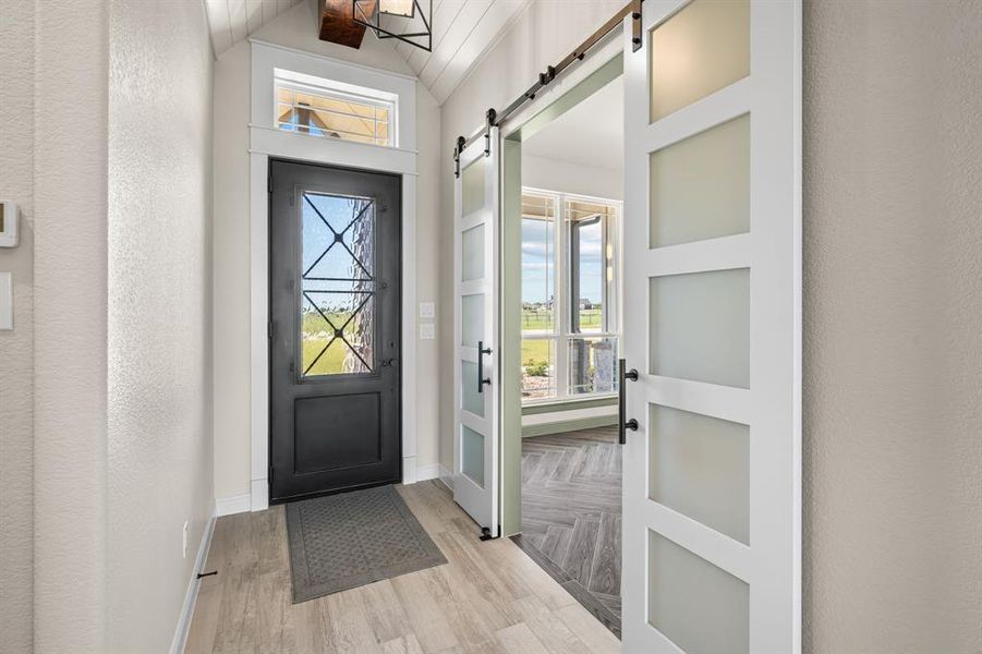 Front Entry with Iron & Glass Door & Office or Dining Room Doorway