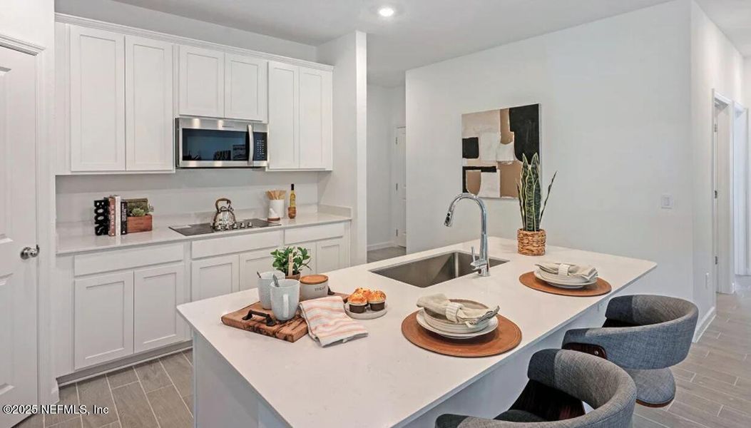 Furnished interior view inside a new home in Edenbrooke at Hyland Trail | 55+: Edenbrooke at Hyland Trail 50s, Green Cove Springs (Image 14). Furnished interior view inside a new home in Edenbrooke at Hyland Trail | 55+: Edenbrooke at Hyland Trail 50s, Green Cove Springs (Image 14).