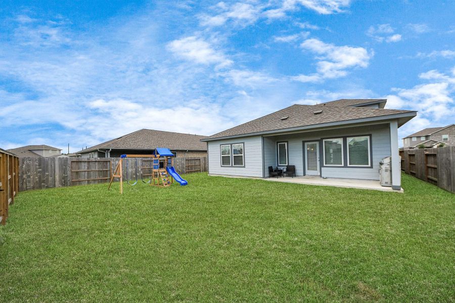 Front exterior of a new home in Heights of Barbers Hill, Baytown, TX, highlighting curb appeal (Image 21).