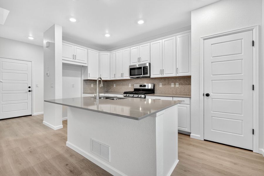 Furnished interior view inside a new home in Parterre Horizon Collection, Thornton (Image 3).