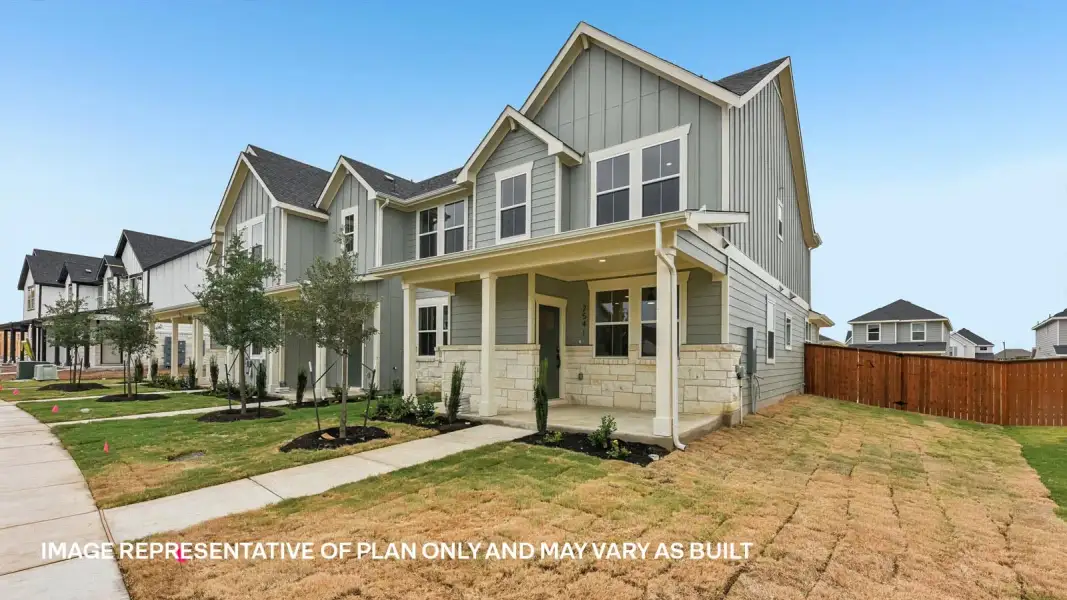 Front exterior of a new home in Avery Centre, Round Rock, TX, highlighting curb appeal (Image 2).
