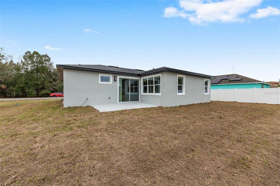 Exterior details and patio area of a home in , Ocala (Image 18).
