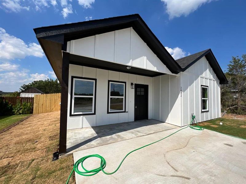 Front view of house with a patio