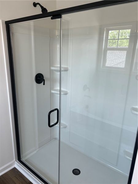 A well-lit, contemporary shower enclosure offers a A well-lit, contemporary shower enclosure offers a