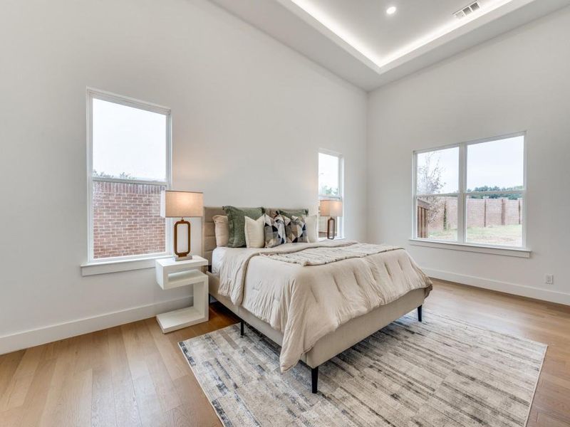 Bedroom with light hardwood / wood-style floors