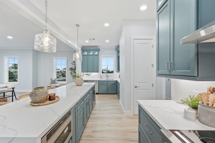 Features solid wood J&K cabinetry with soft-close doors, quartz countertops.