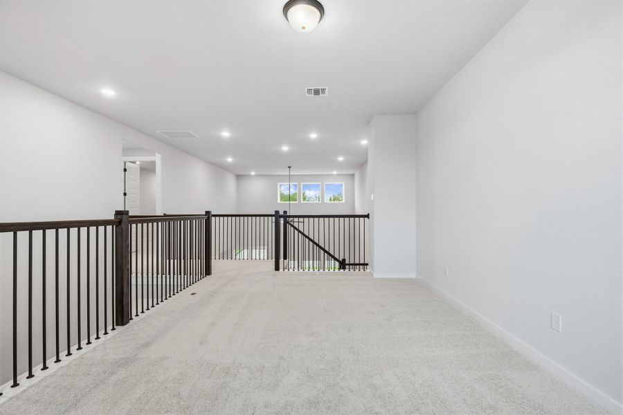 Spacious, unfurnished interior of a new home in Wolf Ranch, Georgetown (Image 43).