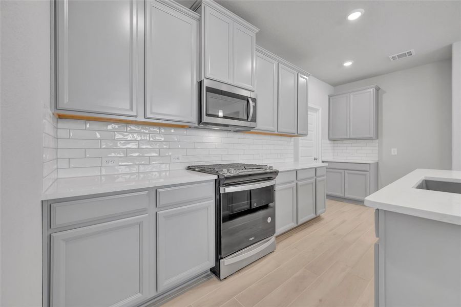 Photo is not of the actual home, but is an inspirational photo of builder’s model home and may depict options, furnishings, and/or decorator features that are not included