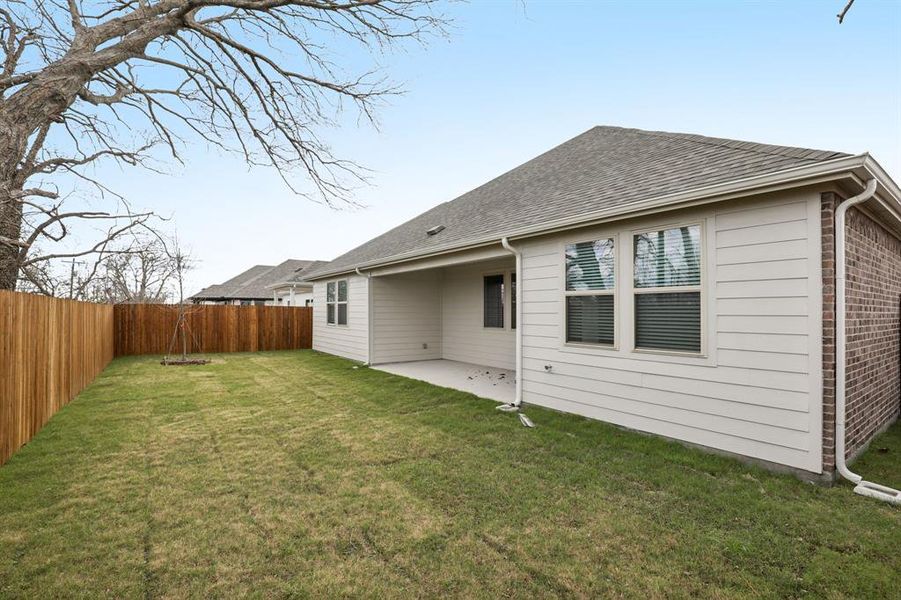 Exterior details and patio area of a home in Parks at Foster Crossing - Premier Series, Anna (Image 3). Exterior details and patio area of a home in Parks at Foster Crossing - Premier Series, Anna (Image 3).