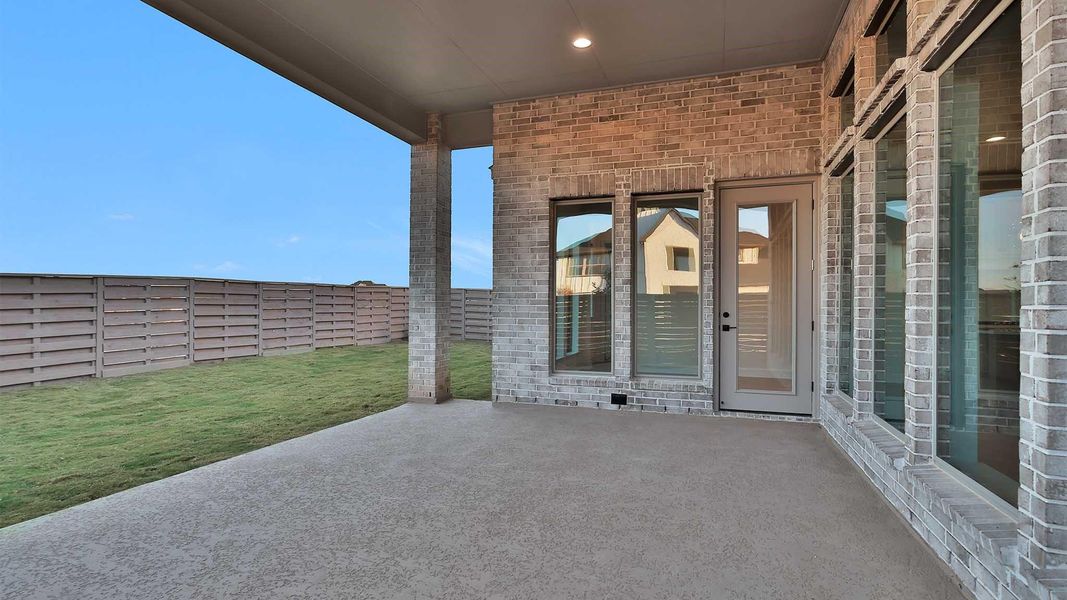 Exterior details and patio area of a home in Austin Point 60', Richmond (Image 3).