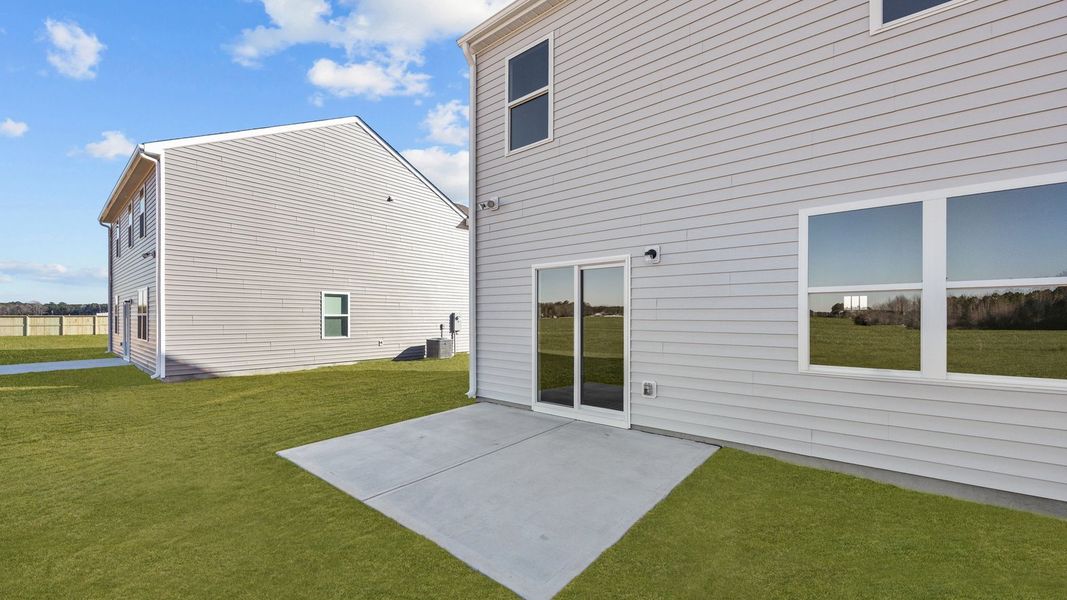 Exterior details and patio area of a home in West New Bern, New Bern (Image 17).
