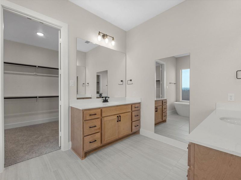 Furnished interior view inside a new home in Dunham Pointe 60′, Cypress (Image 8).