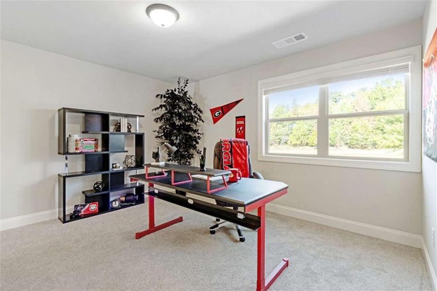 Furnished interior view inside a new home in Ridge Pointe, Athens (Image 18).