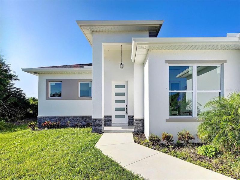 Exterior details and patio area of a home in , Rotonda West (Image 4).