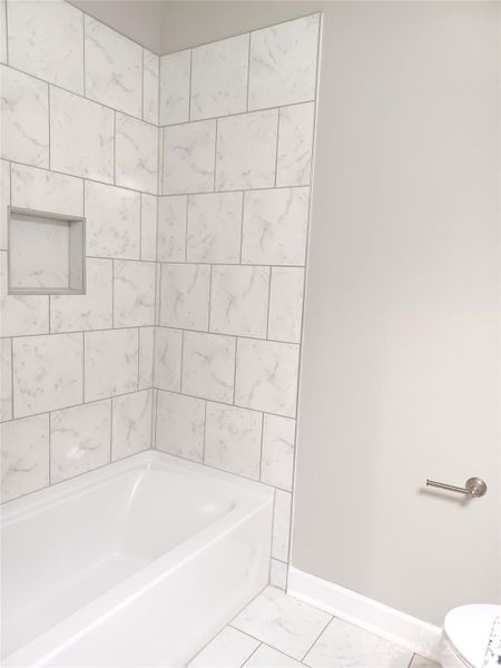 ... and same tile bath details!