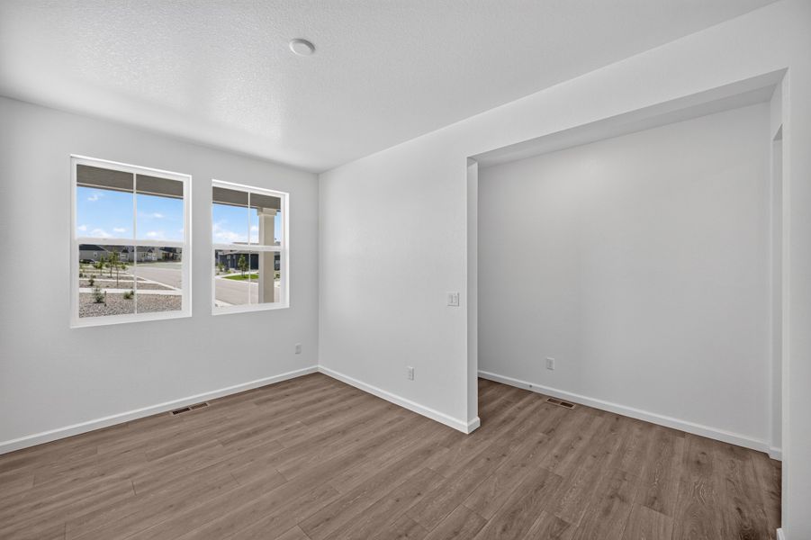 Spacious, unfurnished interior of a new home in The Town Collection at Independence, Elizabeth (Image 15).