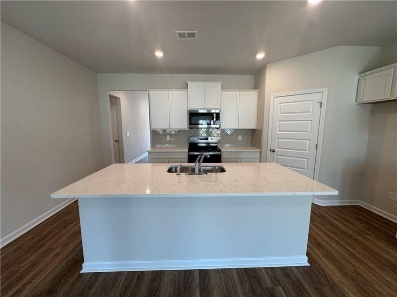 Furnished interior view inside a new home in Oakchase at Hampton, Hampton (Image 6).