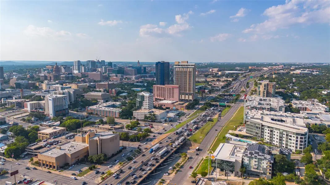 Aerial overview of property's location featuring nearby urban area Aerial overview of property's location featuring nearby urban area