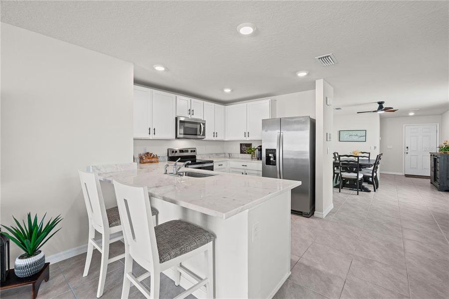 Furnished interior view inside a new home in Silverstone North, Palmetto (Image 12).