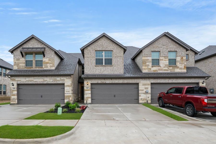 Representative exterior photo of a completed home built from the Bridgeport by Impression Homes in Main Street Village, Mansfield, TX (Image 1). Representative exterior photo of a completed home built from the Bridgeport by Impression Homes in Main Street Village, Mansfield, TX (Image 1).