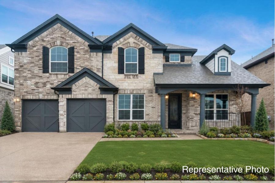 Representative exterior photo of a completed home built from the Fenestra by Grand Homes in Edgewater, Fate, TX (Image 26). Representative exterior photo of a completed home built from the Fenestra by Grand Homes in Edgewater, Fate, TX (Image 26).