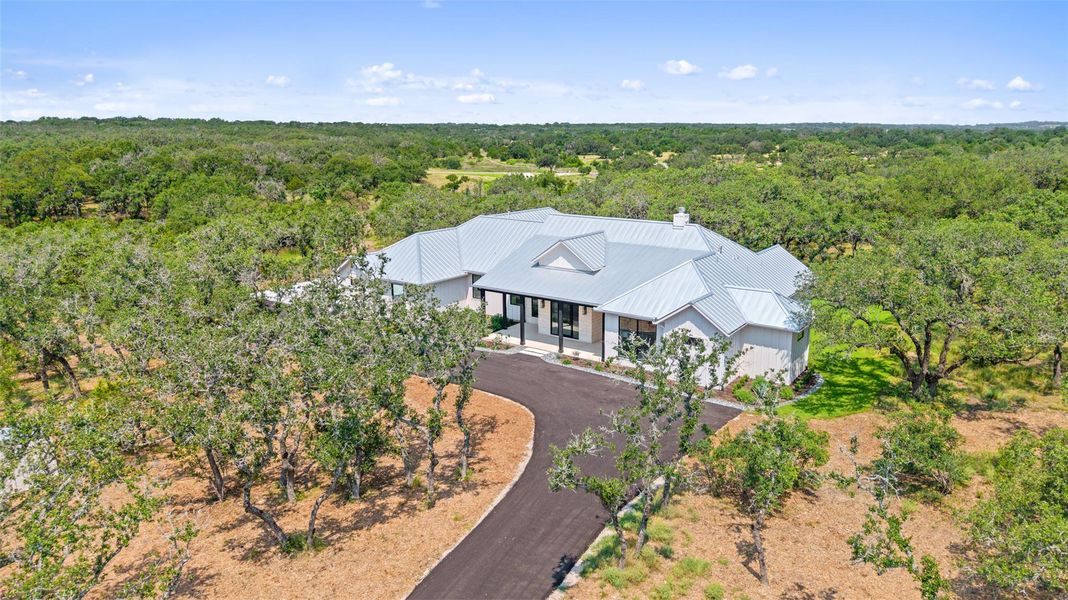 Front exterior of a new home in , Johnson City, TX, highlighting curb appeal (Image 19). Front exterior of a new home in , Johnson City, TX, highlighting curb appeal (Image 19).