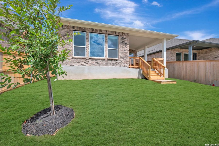 Exterior details and patio area of a home in Mayfair - Select Garden Series, New Braunfels (Image 3). Exterior details and patio area of a home in Mayfair - Select Garden Series, New Braunfels (Image 3).