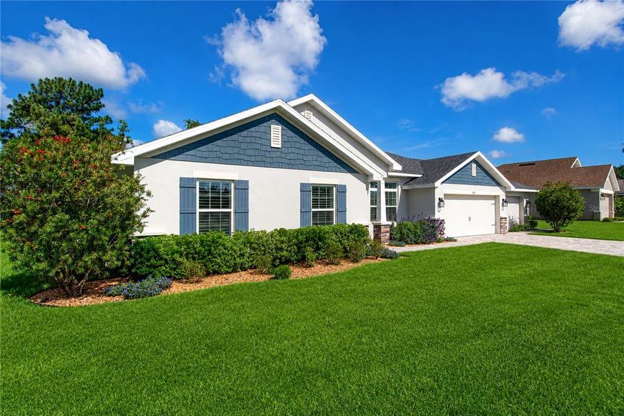 Front exterior of a new home in , Dunnellon, FL, highlighting curb appeal (Image 24).