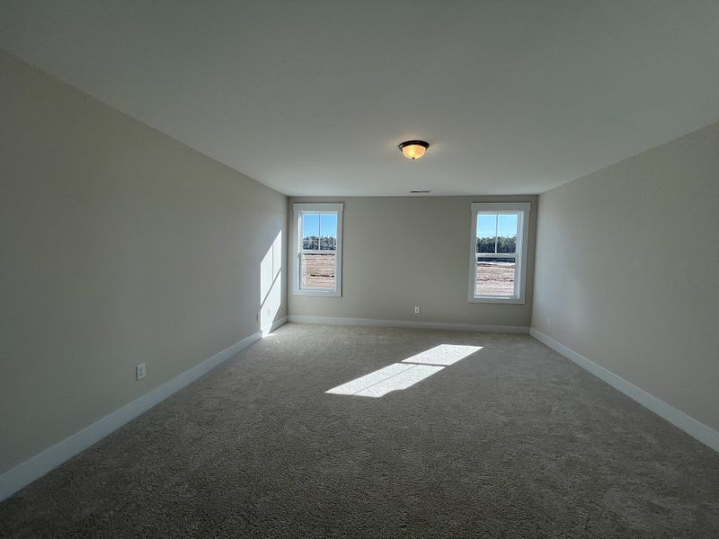 Spacious, unfurnished interior of a new home in River Tide Farms, Bolivia (Image 19).