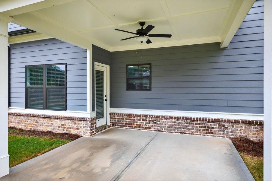 Front exterior of a new home in Spring Creek, Monroe, GA, highlighting curb appeal (Image 25).