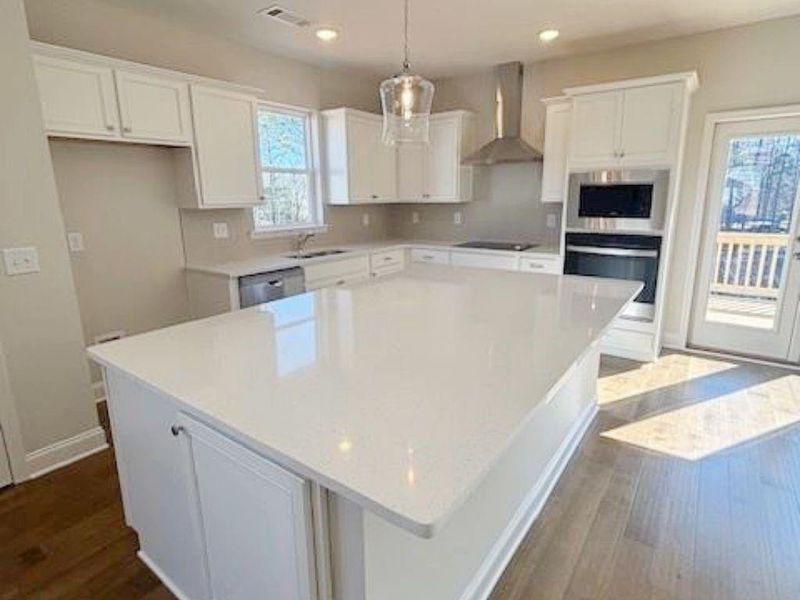 Furnished interior view inside a new home in , Buford (Image 6).