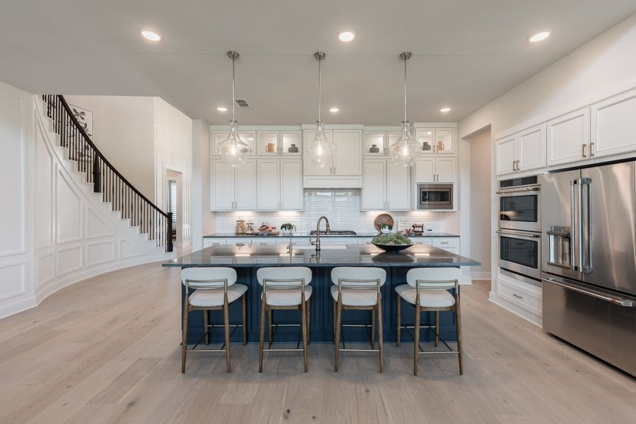 Representative furnished interior of a home built from the Woodbridge by Tri Pointe Homes in Bridgeland, Cypress (Image 14).