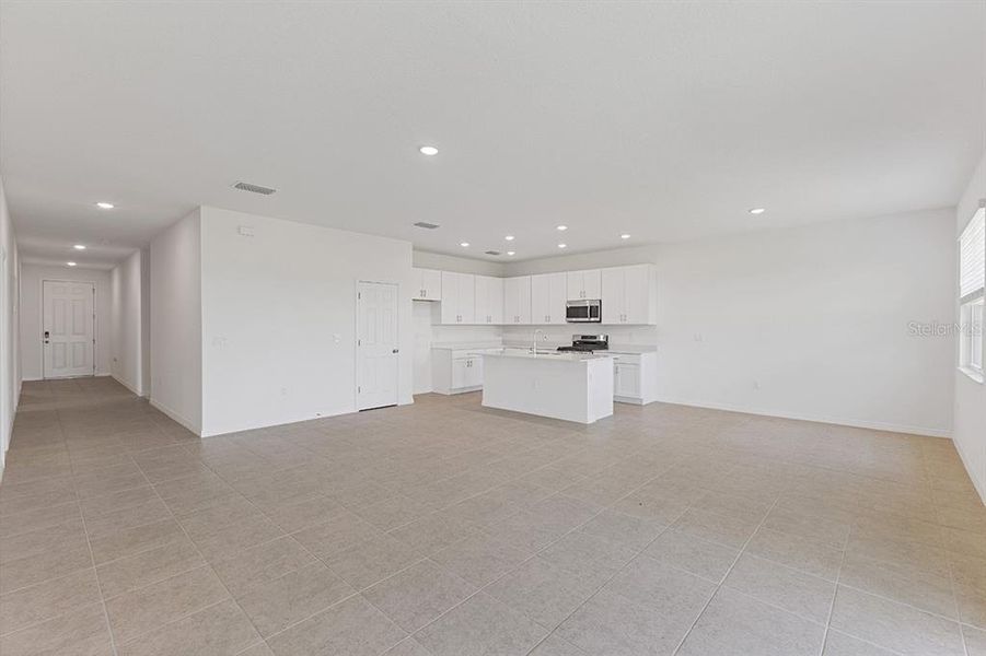 Spacious, unfurnished interior of a new home in Highfield at Twisted Oaks, Wildwood (Image 12).