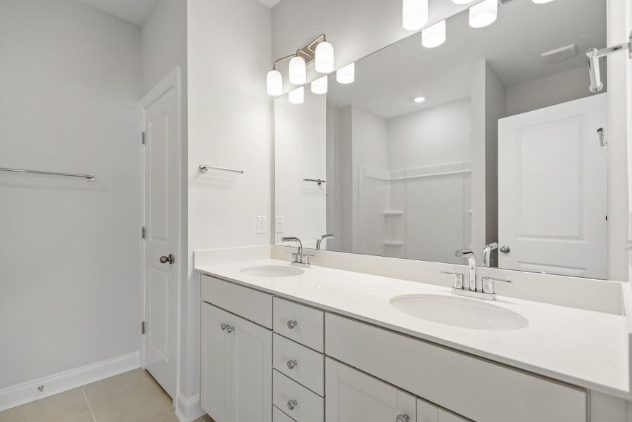 Furnished interior view inside a new home in Tidewater at Lakes of Cane Bay, Summerville (Image 38).