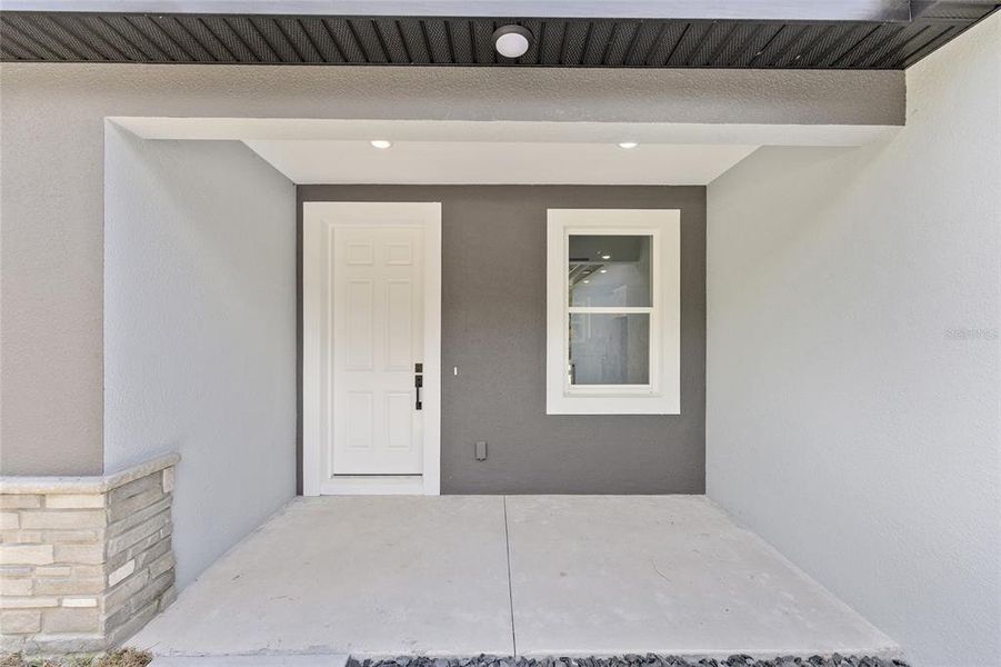 Exterior details and patio area of a home in , Summerfield (Image 4).
