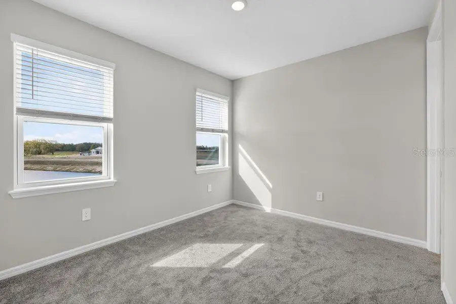 Spacious, unfurnished interior of a new home in Firethorn, Parrish (Image 25).