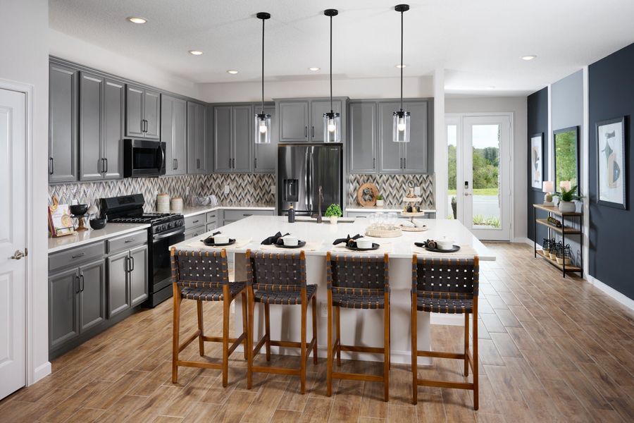 Representative furnished interior of a home built from the Hampton by Park Square Residential in Summerbrooke, Mount Dora (Image 5).