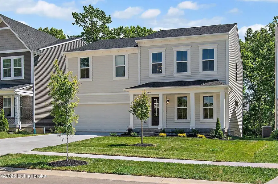 Front exterior of a new home in Bridle Run, Louisville, KY, highlighting curb appeal (Image 1). Front exterior of a new home in Bridle Run, Louisville, KY, highlighting curb appeal (Image 1).
