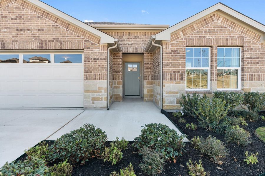 Front exterior of a new home in Riverview, Georgetown, TX, highlighting curb appeal (Image 2). Front exterior of a new home in Riverview, Georgetown, TX, highlighting curb appeal (Image 2).