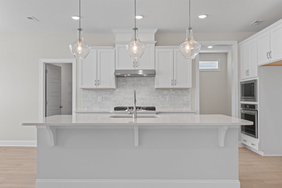 Representative furnished interior of a home built from the The Whitley by RobuckHomes in Kennebec Crossing, Angier (Image 90). Representative furnished interior of a home built from the The Whitley by RobuckHomes in Kennebec Crossing, Angier (Image 90).