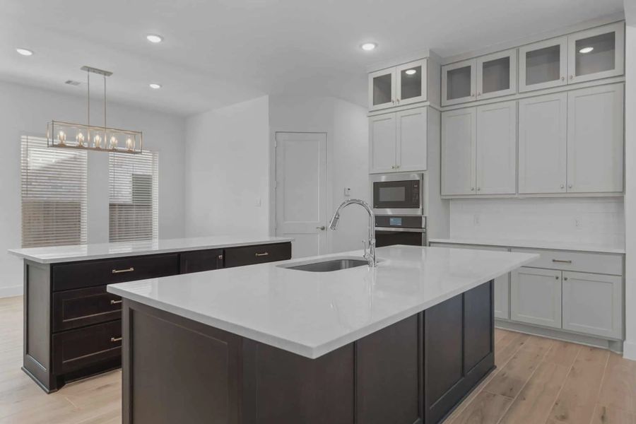 Representative furnished interior of a home built from the Lakeway by Chesmar Homes in Meridiana 50's, Manvel (Image 9).