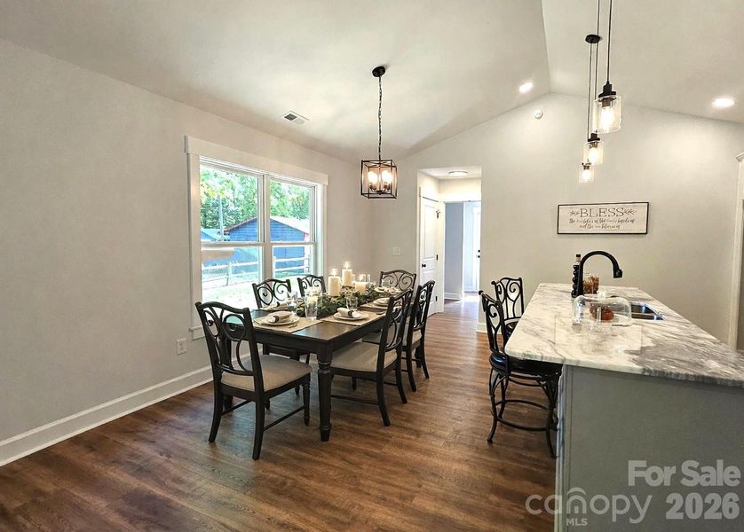Lots of dining options with large island that seats 4 & Dining area. Great for entertaining.