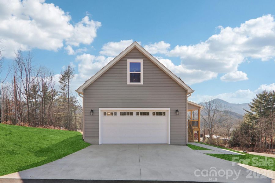 Front exterior of a new home in , Candler, NC, highlighting curb appeal (Image 21). Front exterior of a new home in , Candler, NC, highlighting curb appeal (Image 21).