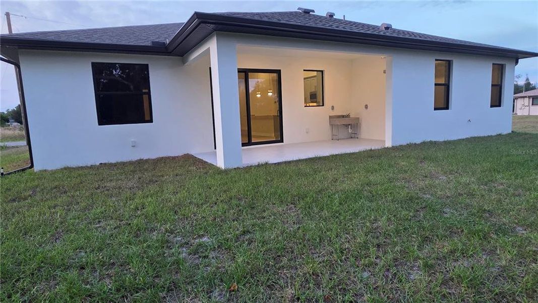 Exterior details and patio area of a home in , North Port (Image 34).