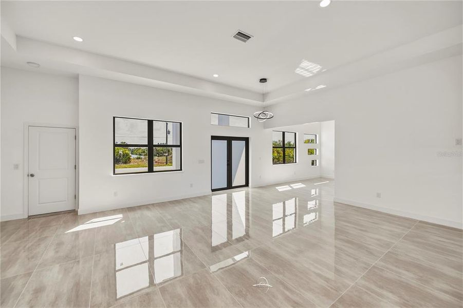 Spacious, unfurnished interior of a new home in , Port Charlotte (Image 60).