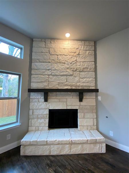 Austin Chalk stone to ceiling fireplace is gas, can burn wood & has stained cedar mantle Austin Chalk stone to ceiling fireplace is gas, can burn wood & has stained cedar mantle