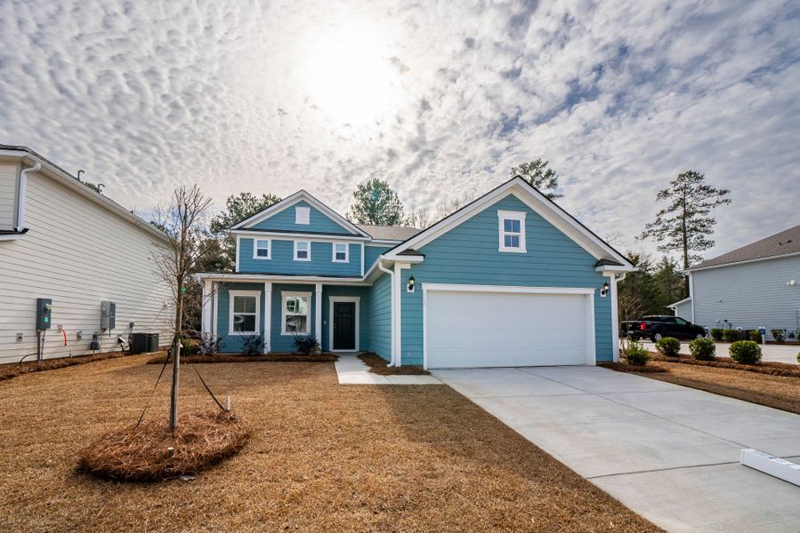 Front exterior of a new home in Monroe Preserve, Chapin, SC, highlighting curb appeal (Image 24).